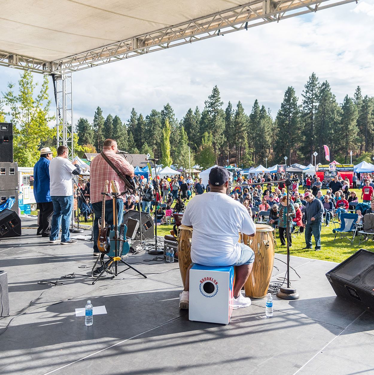 Musicians playing in front of crowd at Valleyfest.