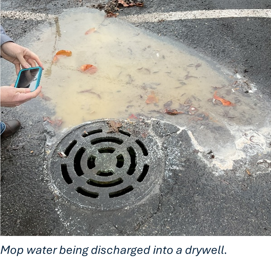Mop water being discharged into a drywell.